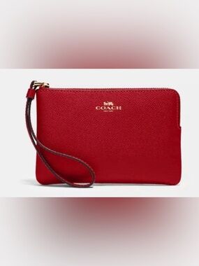 Coach Corner Zip Wristlet in red crossgrain leather with dust bag like new